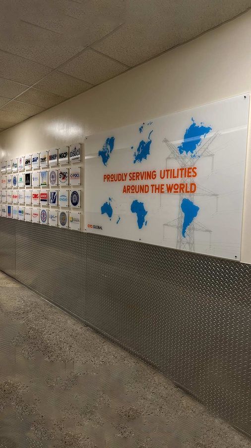 CTC Global acrylic sign mounted on the wall