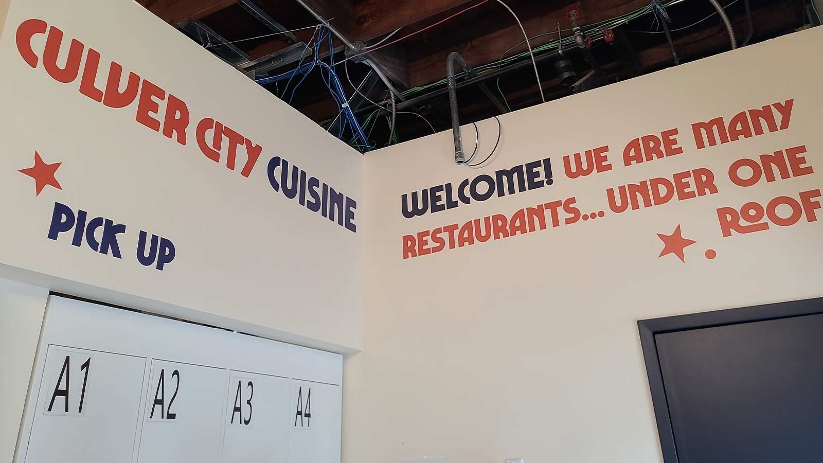 Culver City Cuisine vinyl lettering attached to the walls