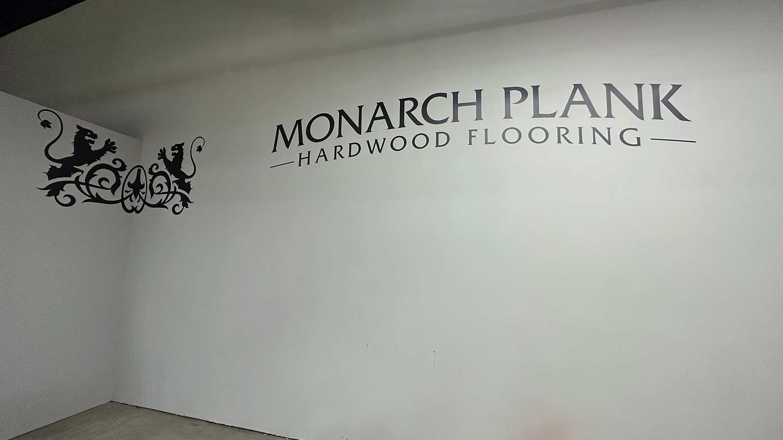 Monarch Plank vinyl lettering attached to the wall