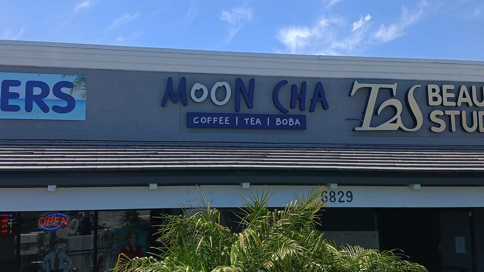 MoonCha light box sign mounted on the building top