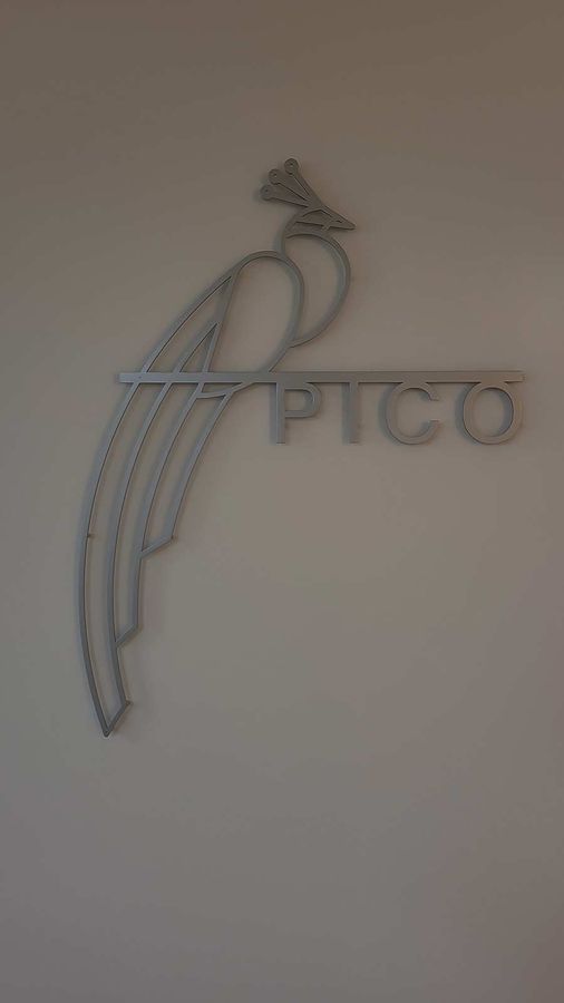 Pico Clinics logo sign attached to the wall