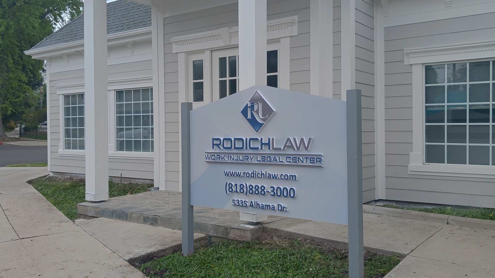 Rodich Law yard sign placed in front of the building