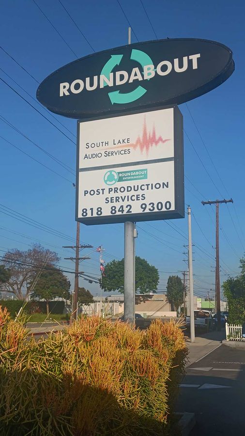 Roundabout Entertainment pylon sign installed outdoors