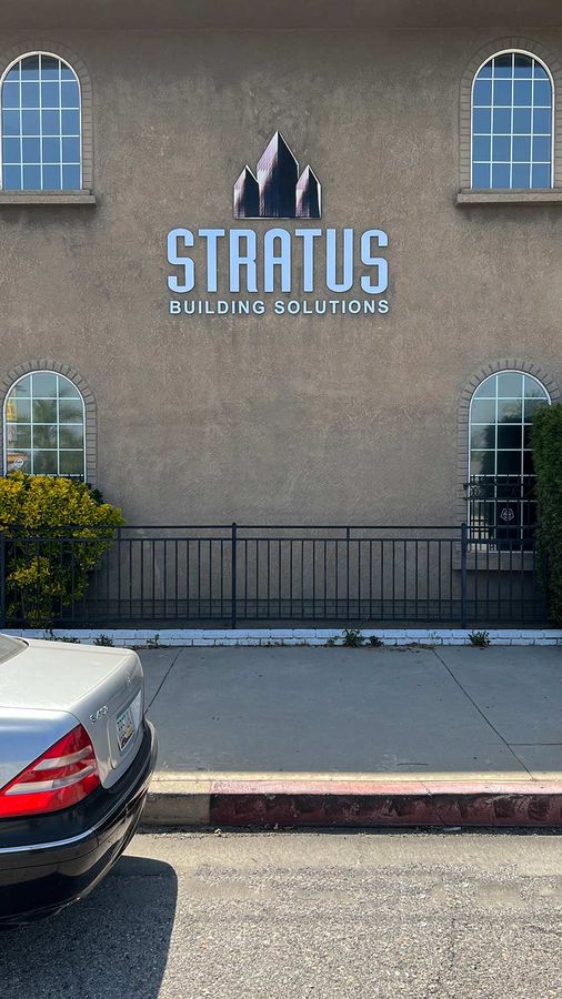 Stratus Building Solutions 3D sign installed on the wall