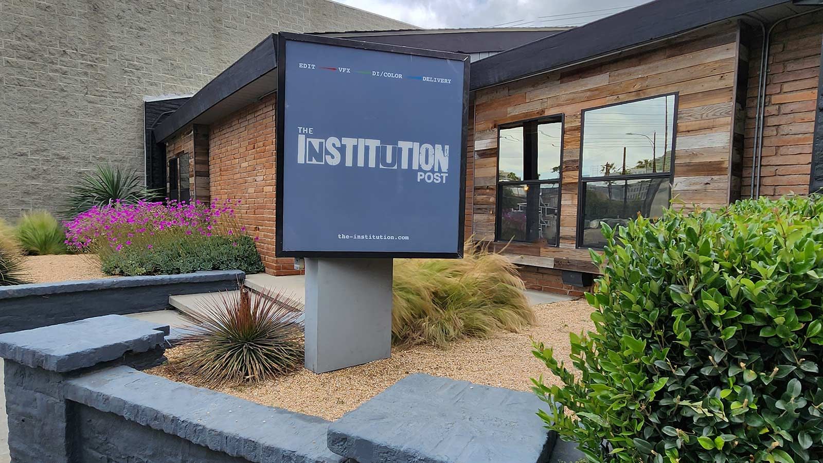 The Institution Post outdoor sign repair for branding