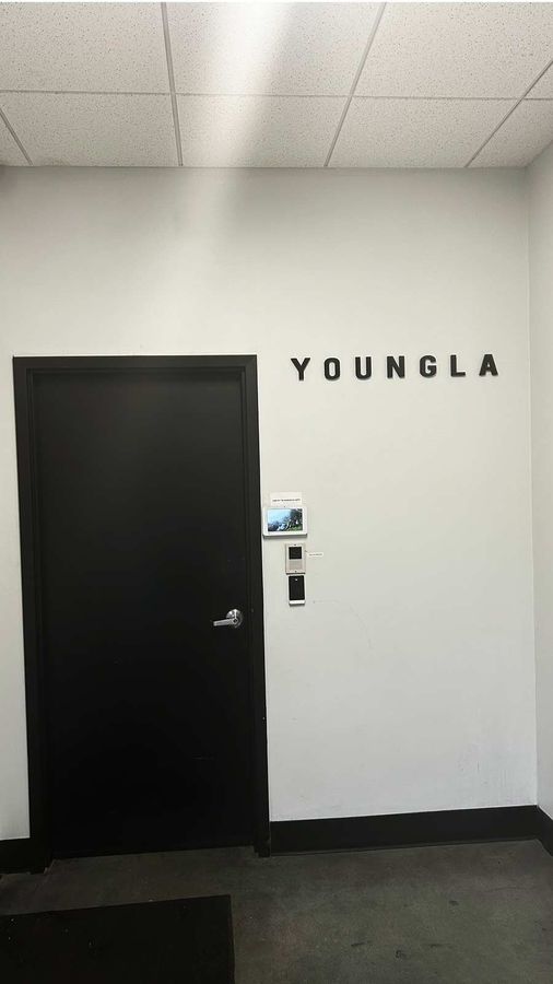 Young LA logo sign attached to the wall