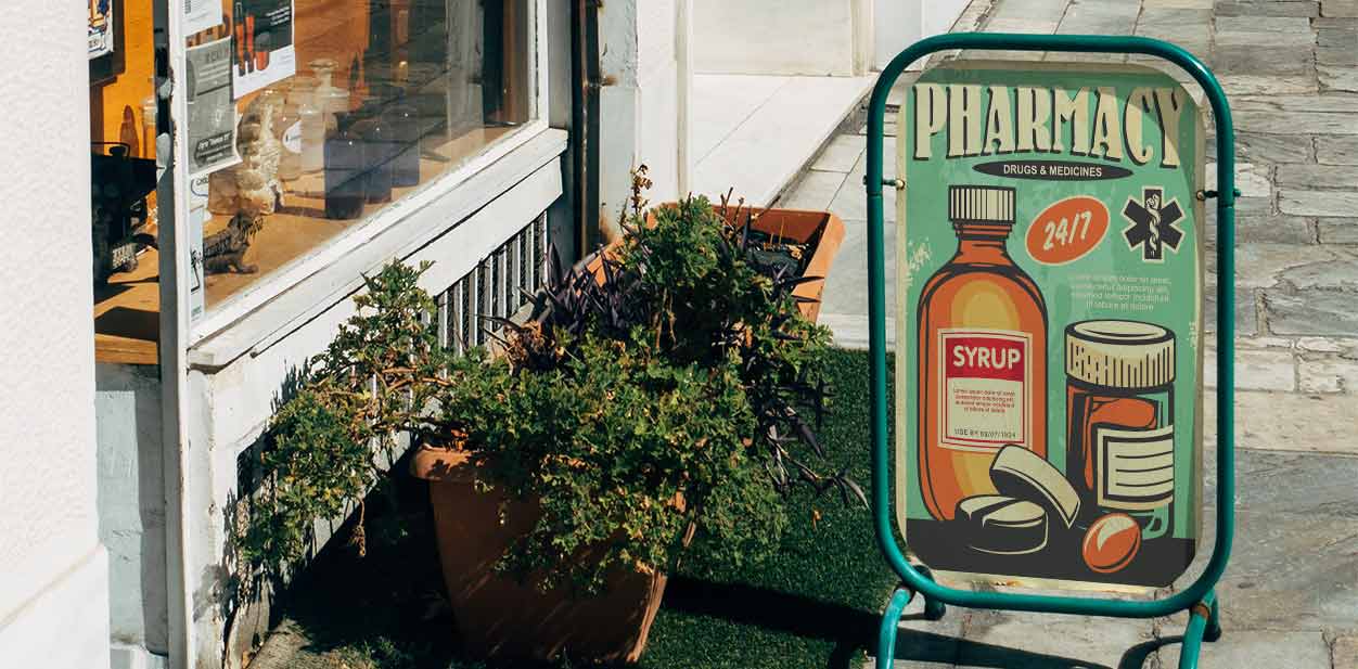 Retro style pharmacy signage displayed outdoors for advertising