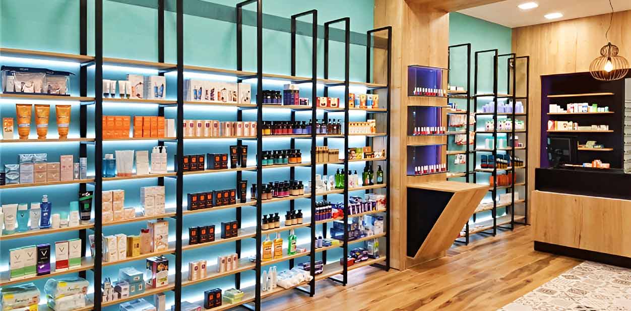 Contemporary pharmacy interior design with green accent walls