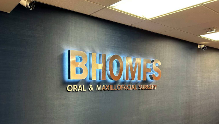 BHOMFS wall mounted signage in backlit style made of aluminum and acrylic for indoor branding