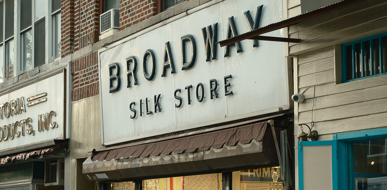 Vintage retail store signage design installed on the store facade