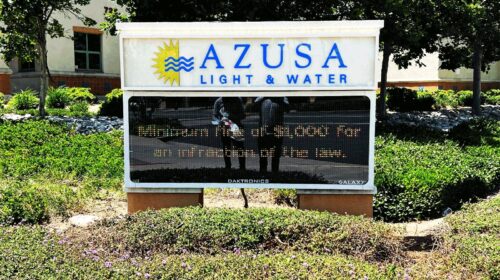 AZUSA push through sign installed outdoors