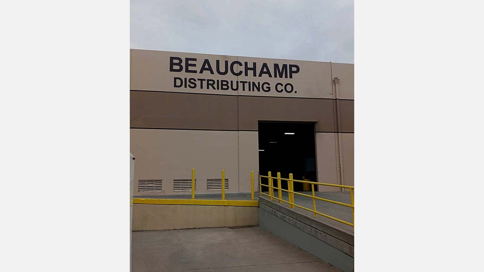 Beauchamp Distributing Company PVC sign on the building