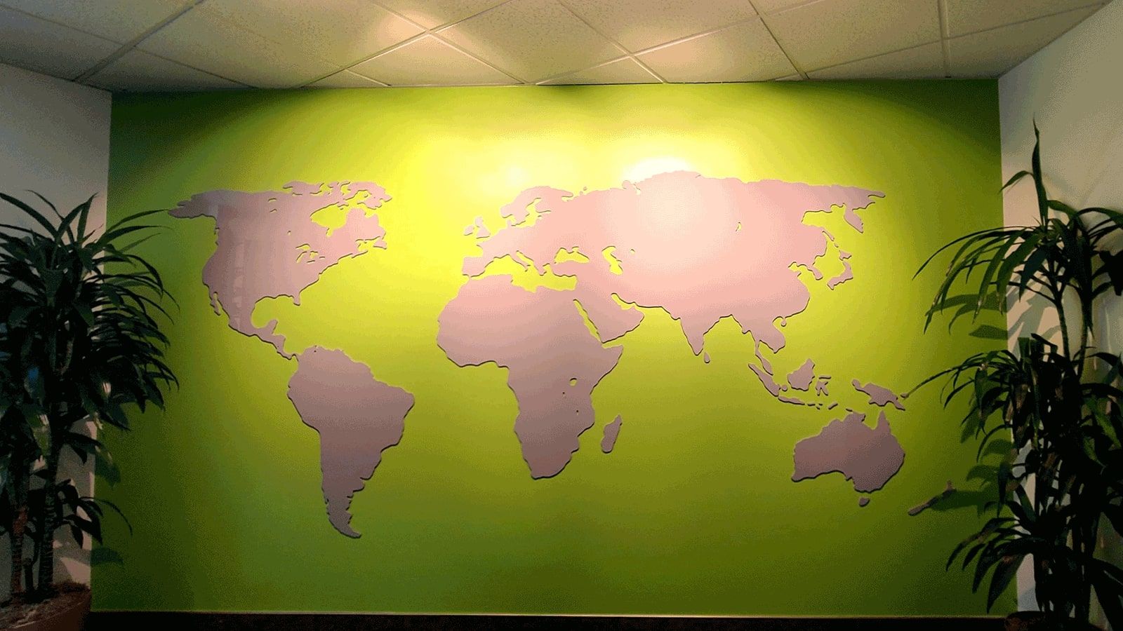 Blank world map acrylic sign attached to the wall