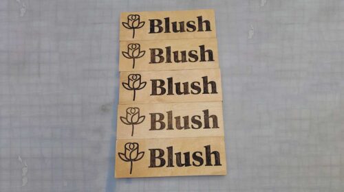 Blush wooden sign with laser etching