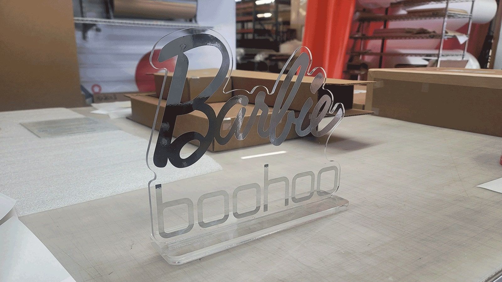 Boohoo acrylic sign for a tabletop placement
