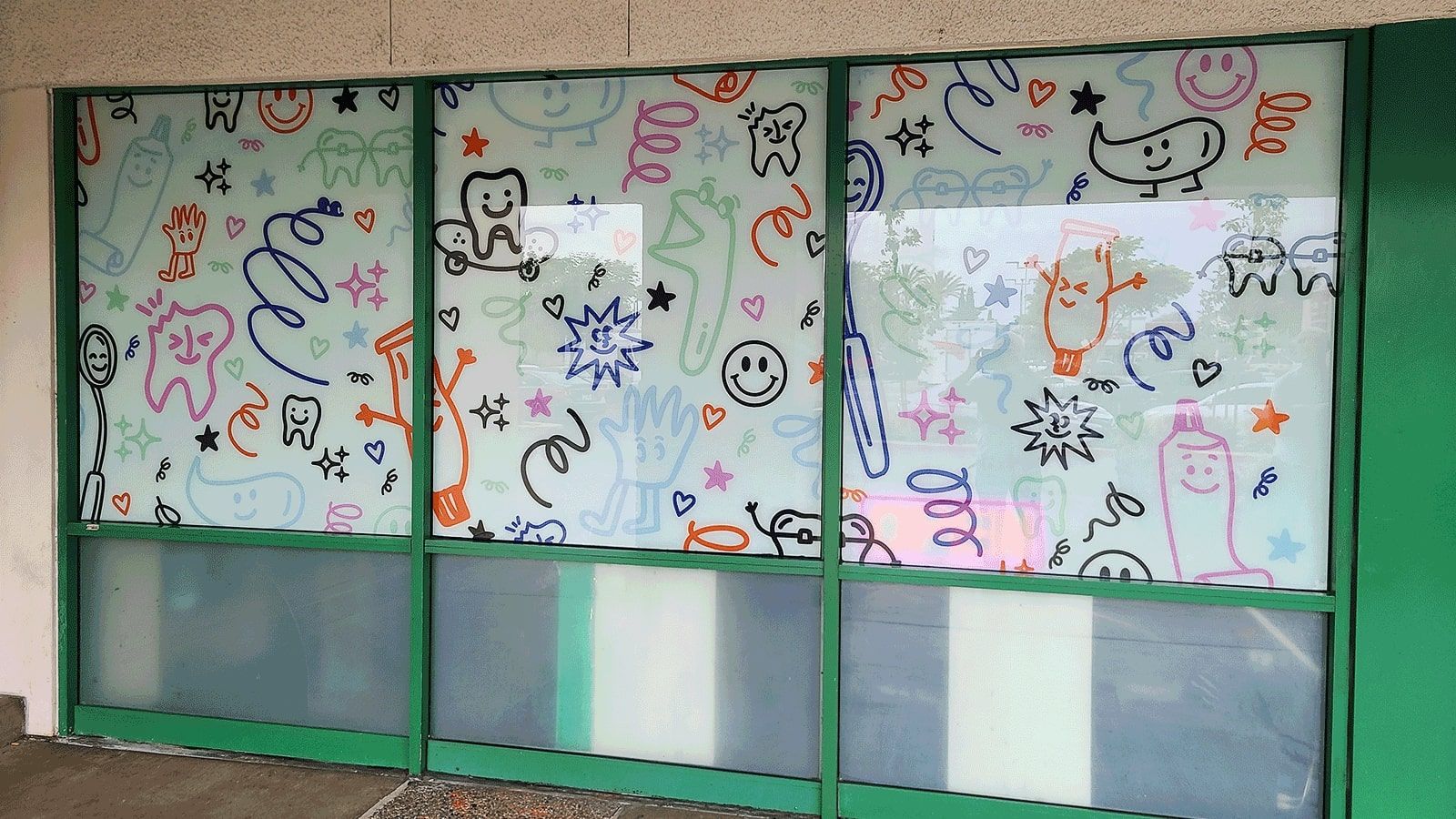 Dreamhouse Dental window decals used outdoors