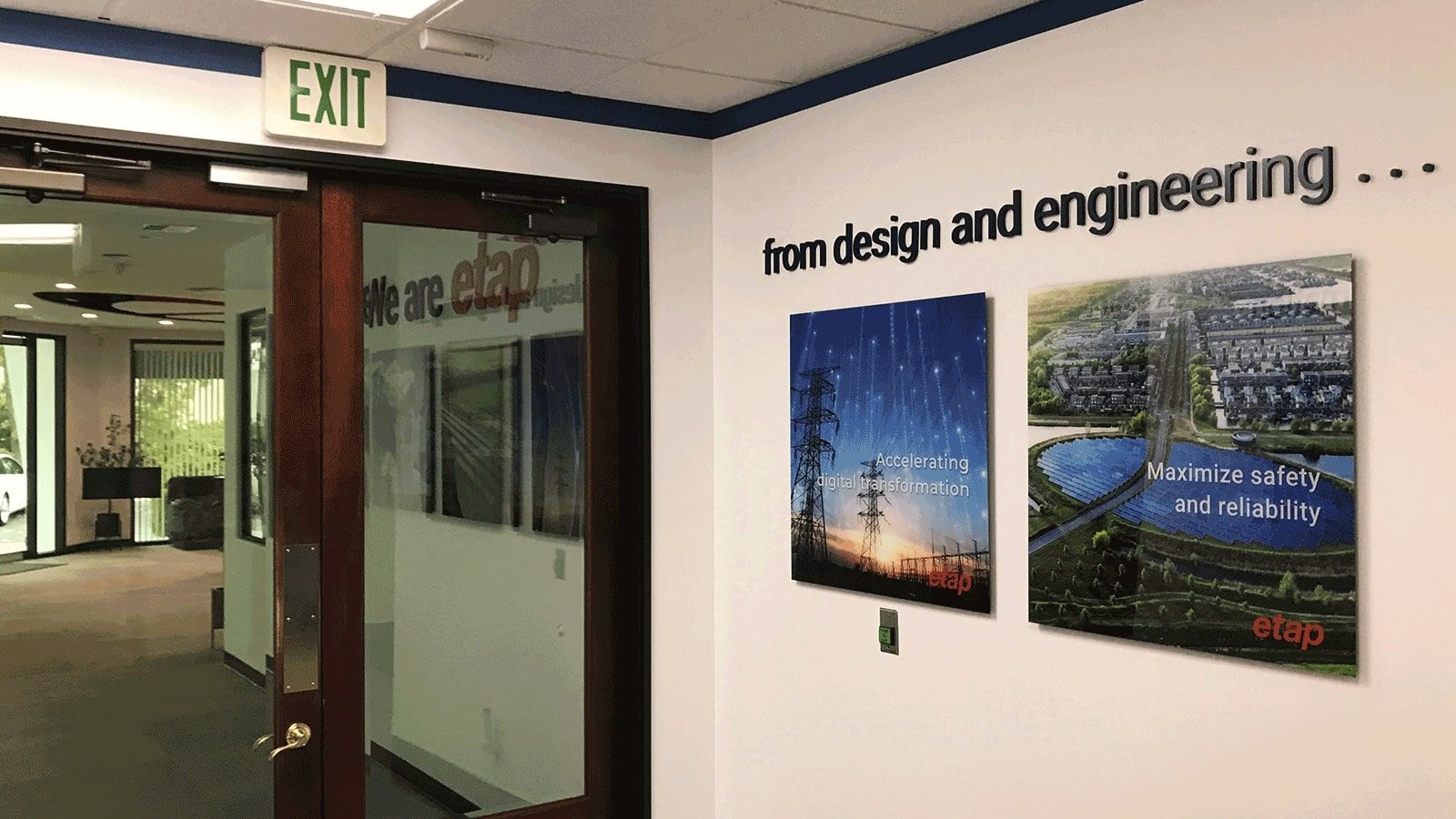 Etap acrylic signs attached to the wall
