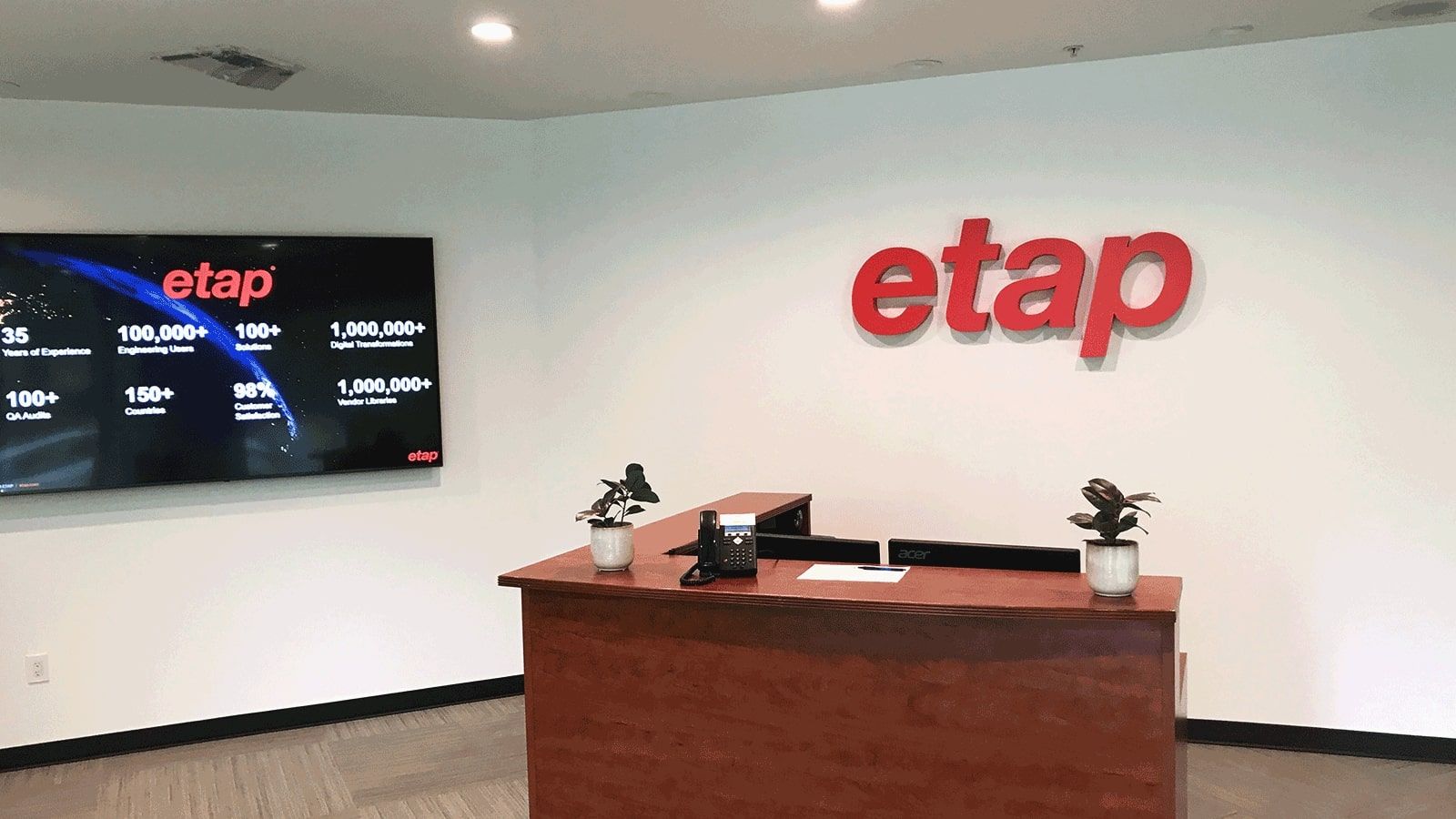 Etap logo sign attached to the wall