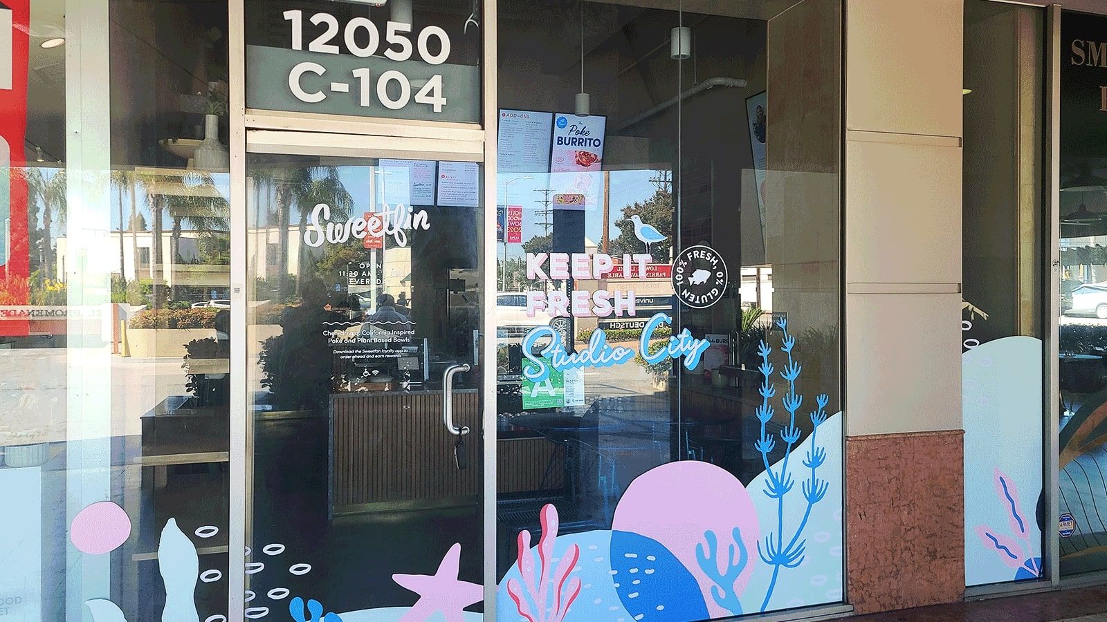 Eye-catching window decals attached to the storefront