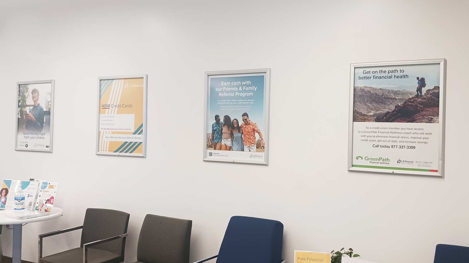 LA Financial Credit Union lobby signs mounted on the walls