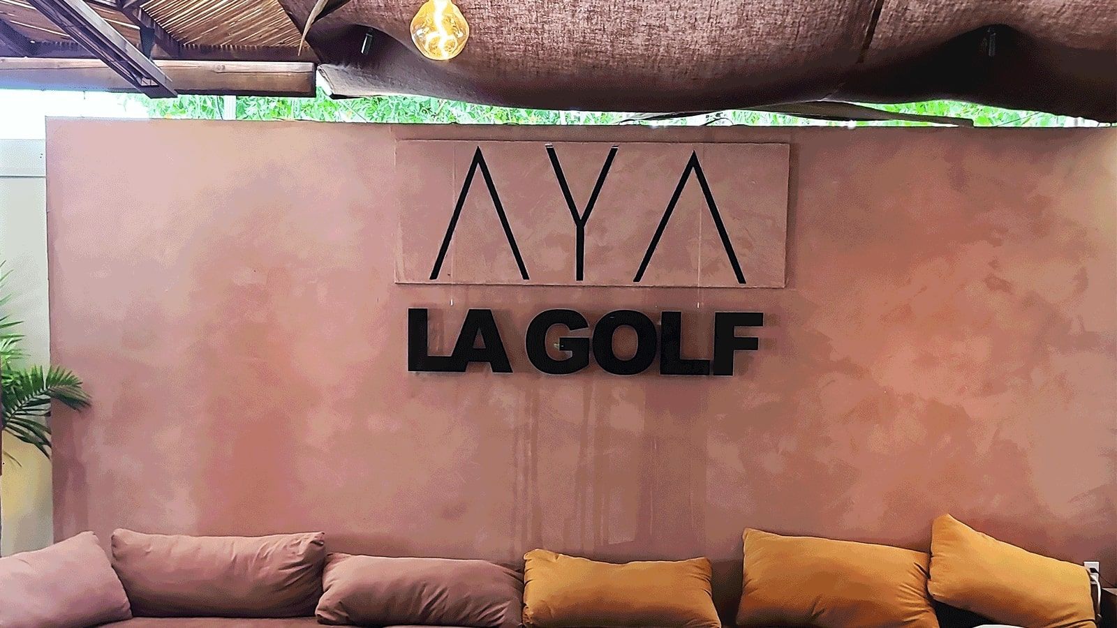LA Golf interior sign attached to the wall
