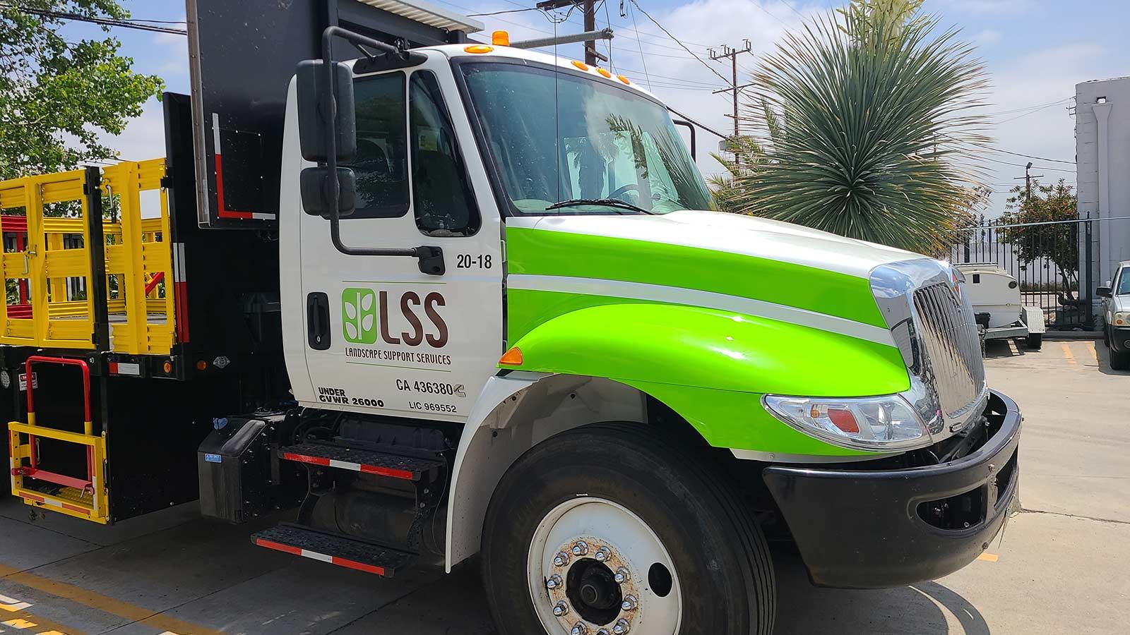 Landscape Support Services car wrap applied to the door