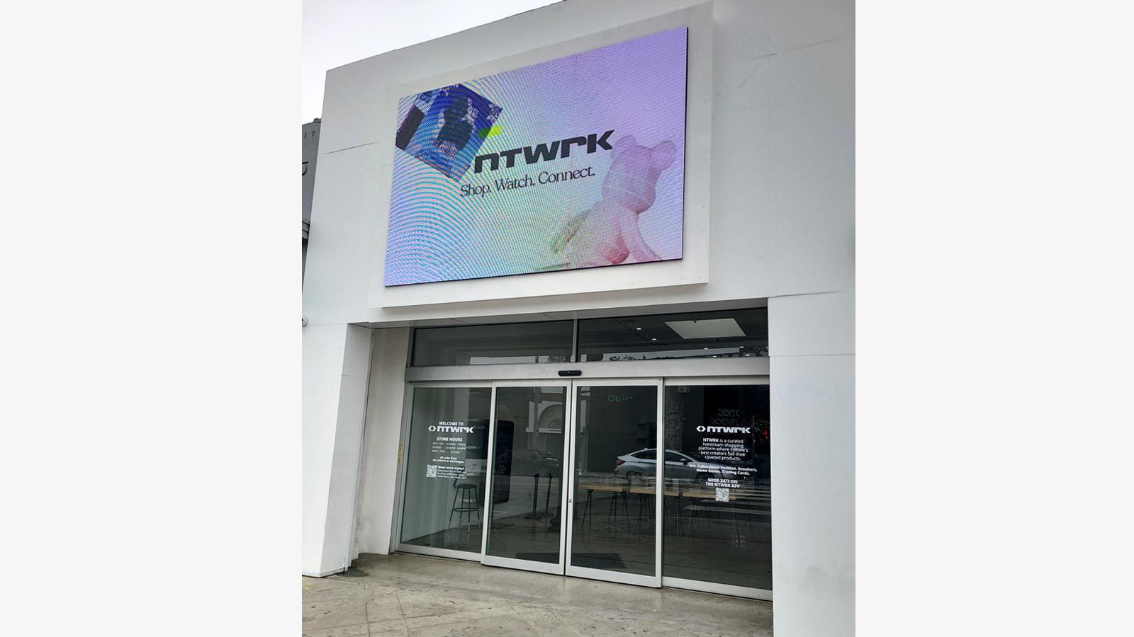 NTWRK vinyl lettering on storefront windows