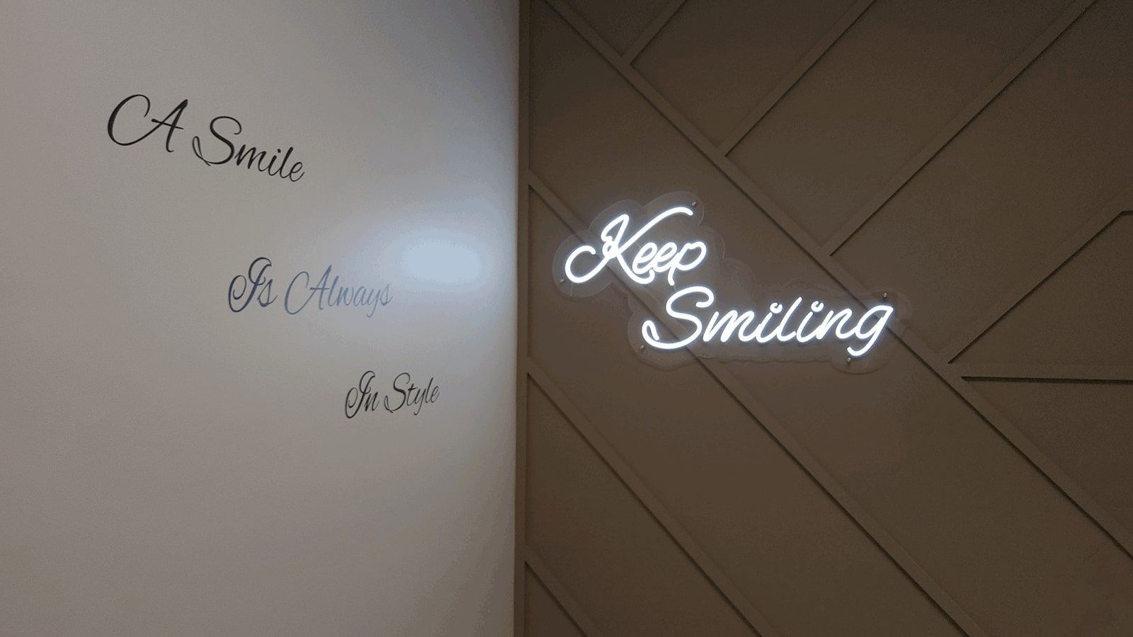 Viva Smile light up sign mounted on the wall