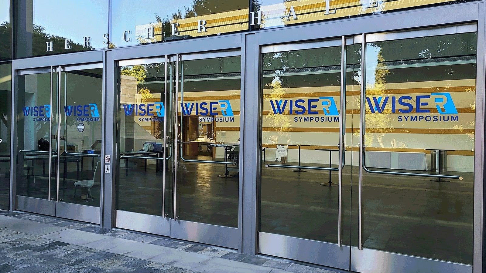 WISER Symposium vinyl lettering applied to the doors