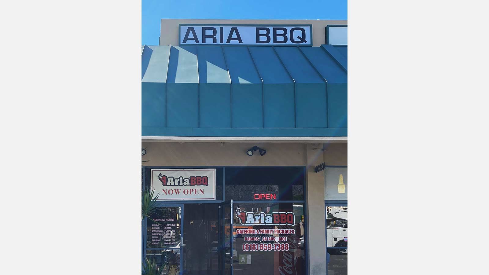 Aria BBQ building sing