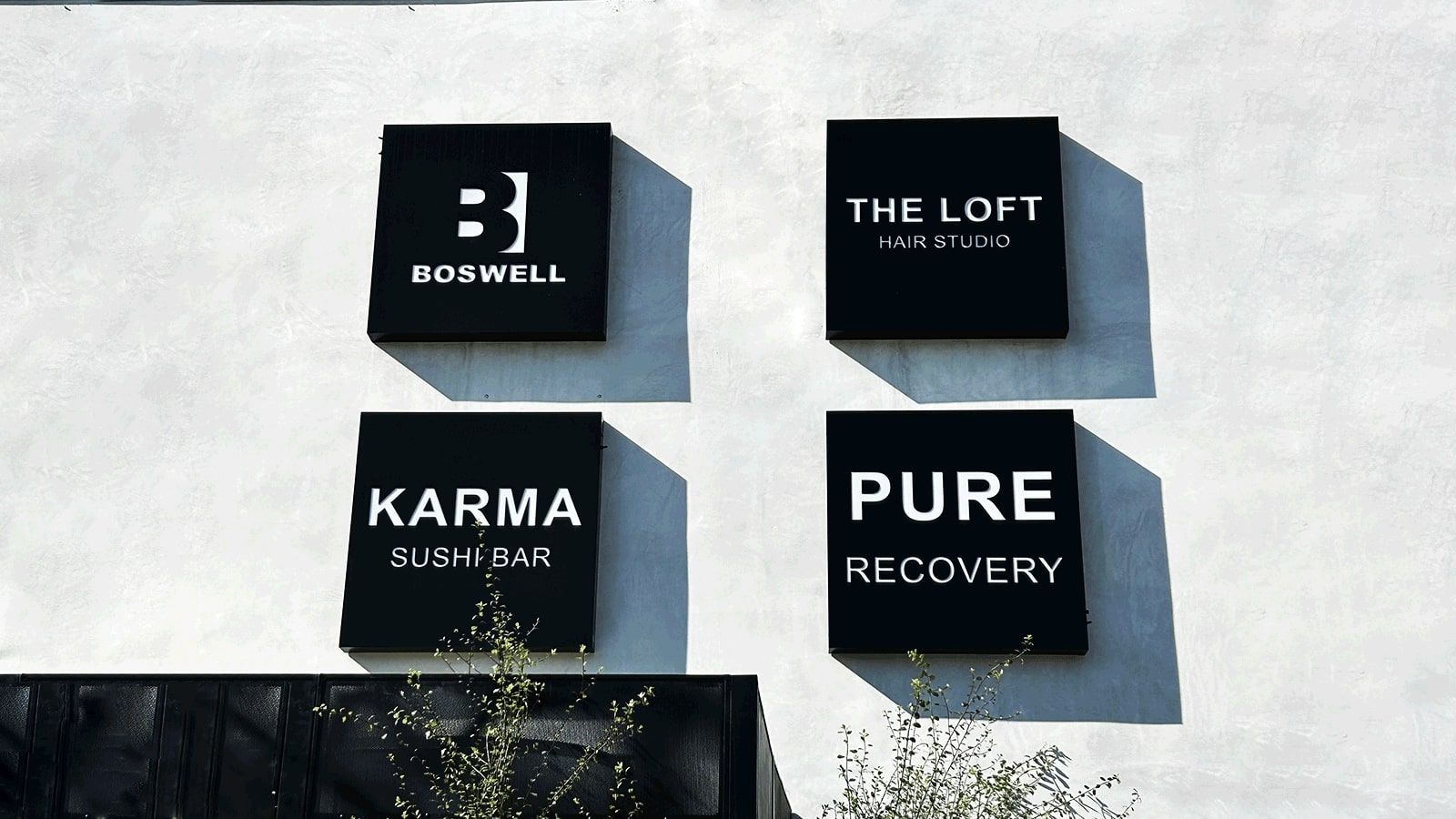 Boswell light box signs attached to the wall