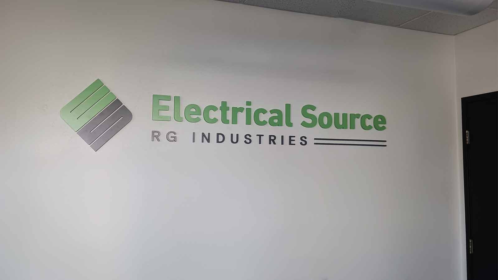 Electrical Source Holdings 3D signs attached to the wall