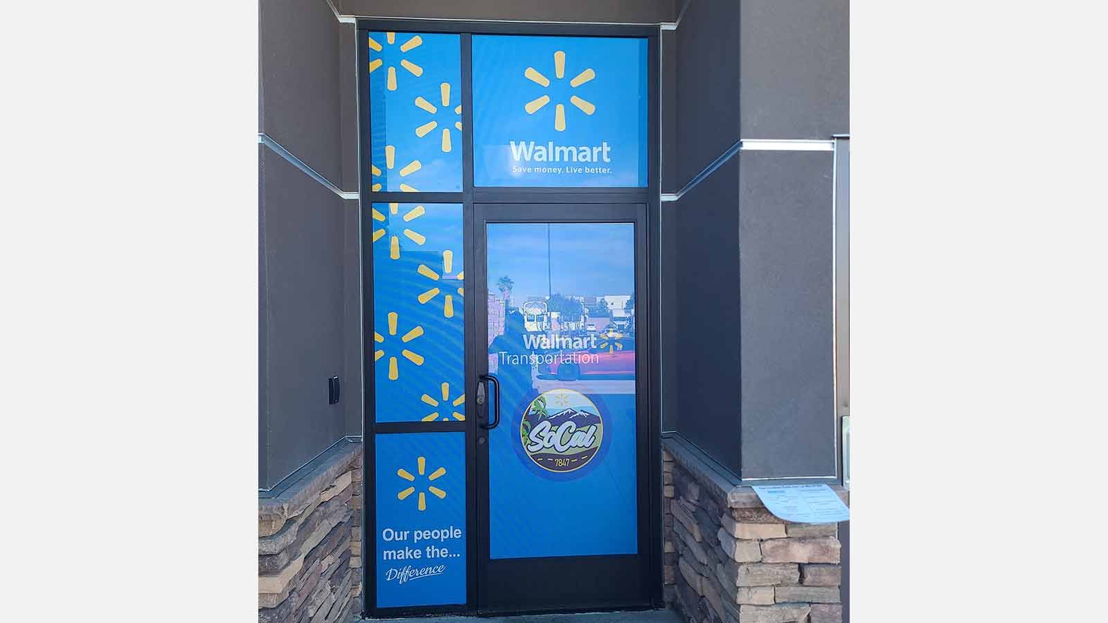 Walmart custom decals applied to the door glass