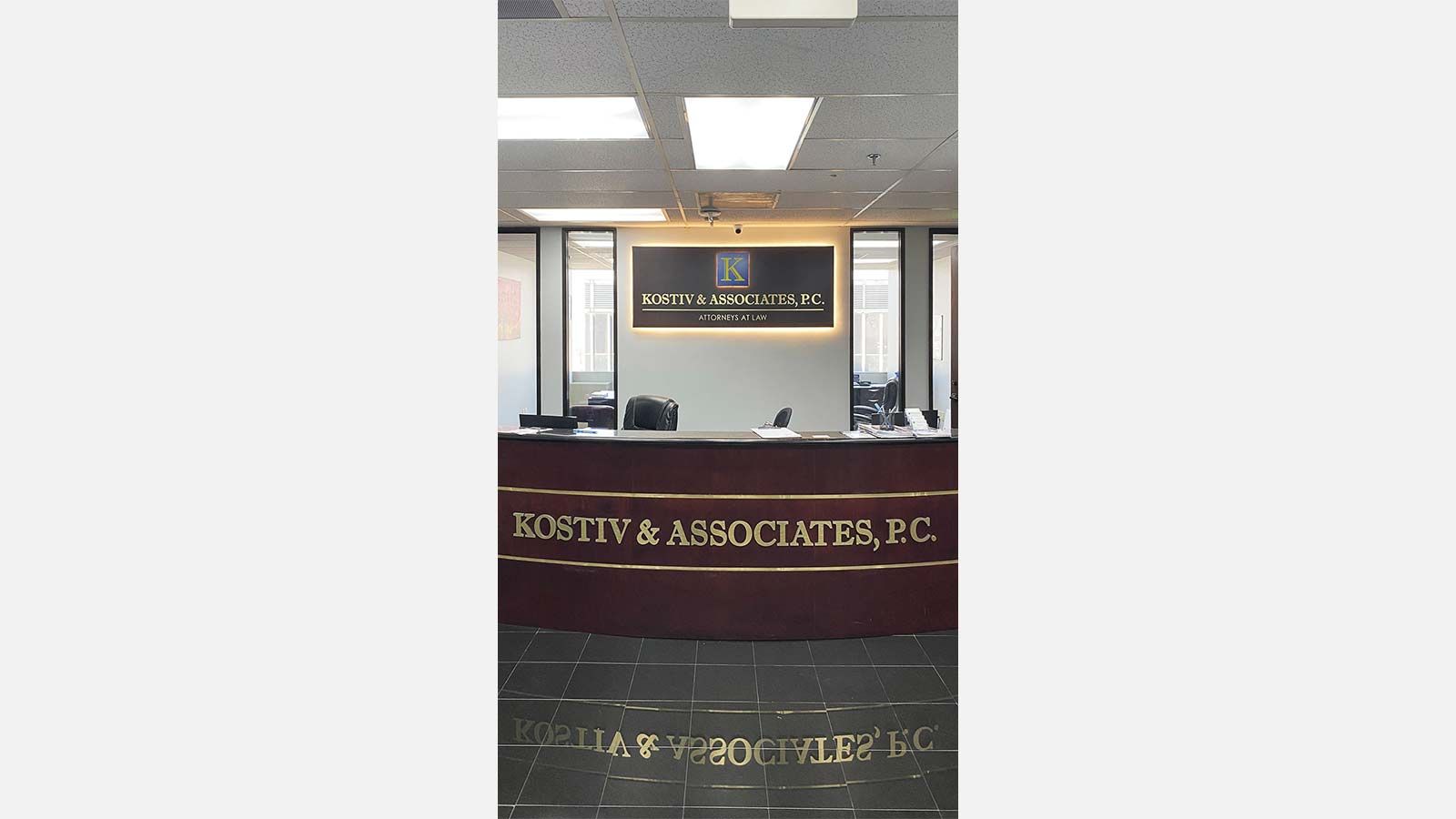 kostiv and associates backlit reception sign