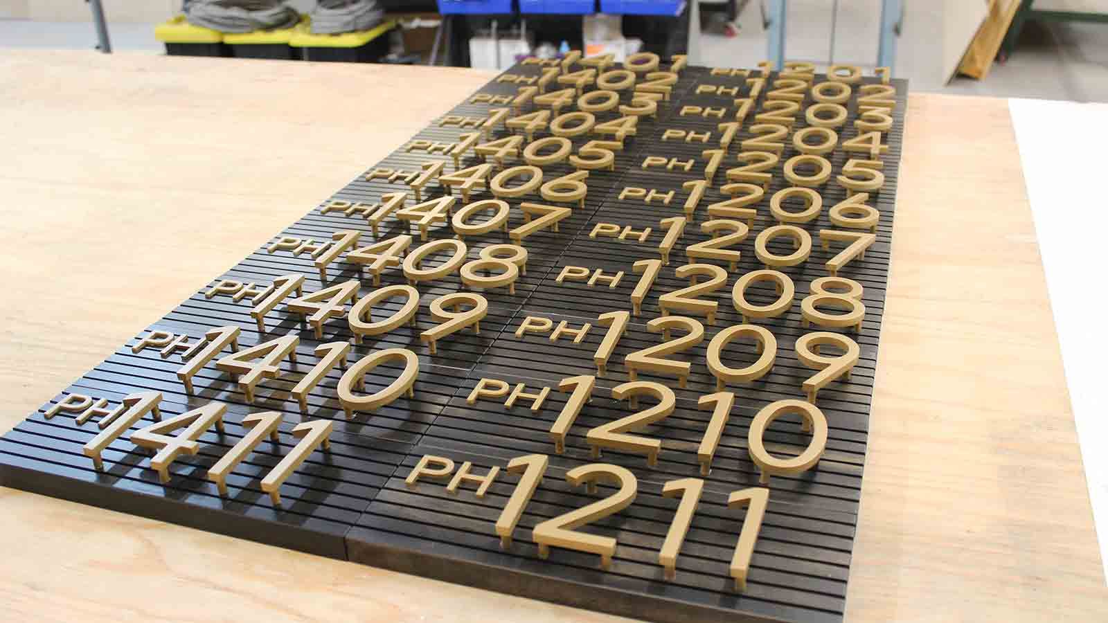raised golden address numbers and letters