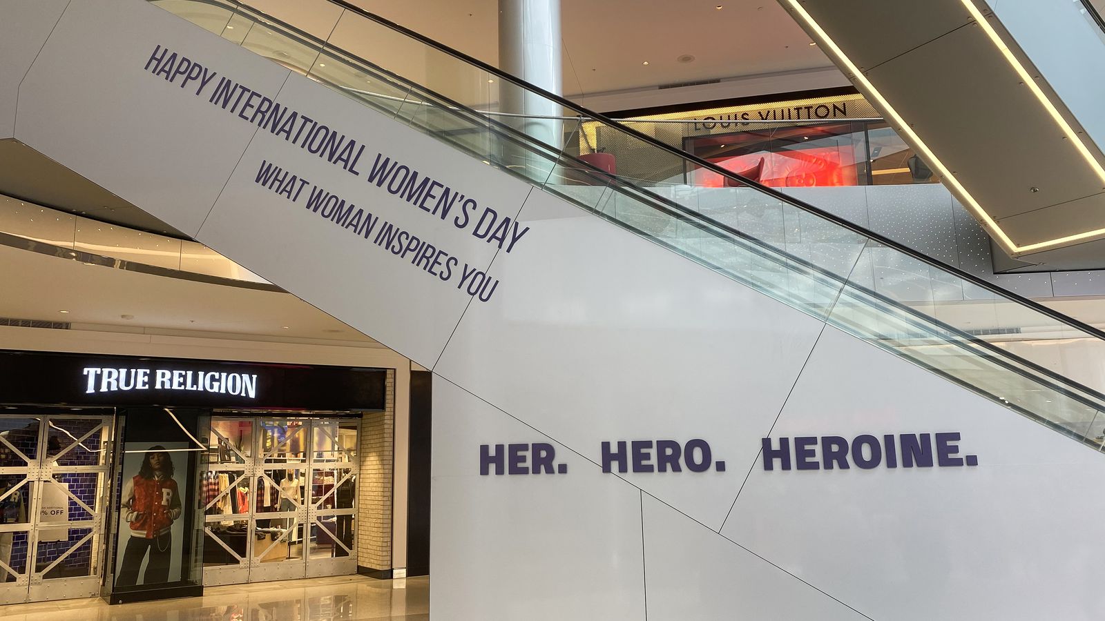 shopping mall escalator branding 3d letters