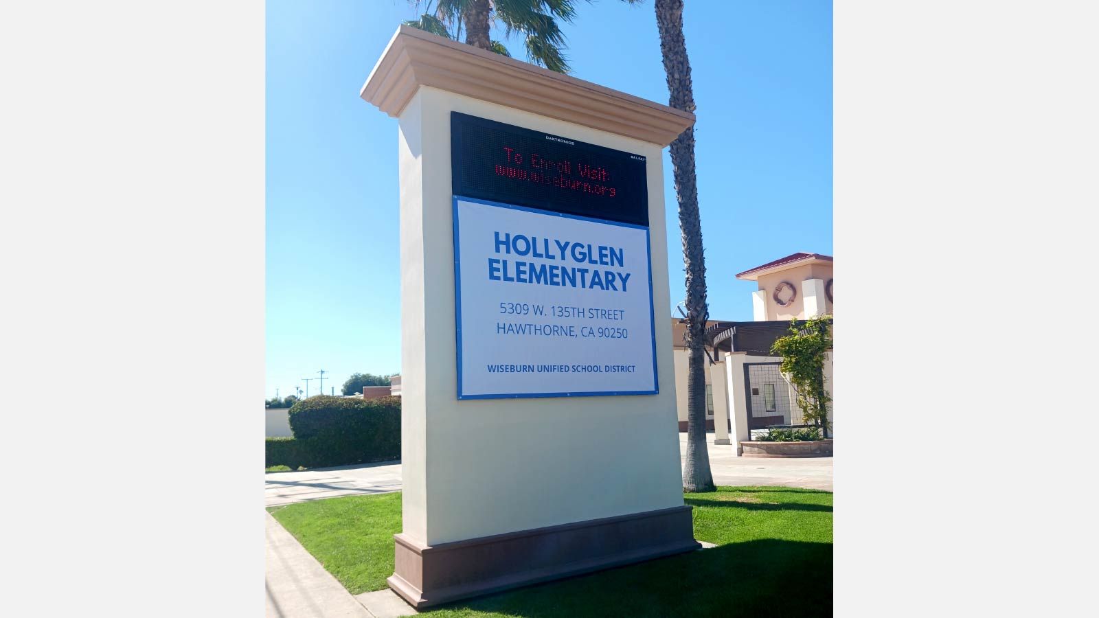 Hollyglen Elementary School banner set up on a base