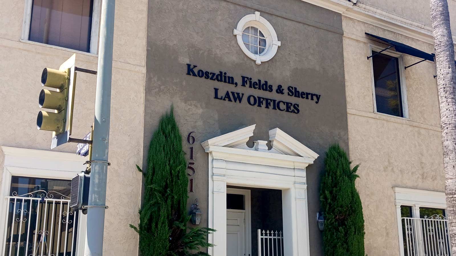 Koszdin, Fields & Sherry building sign mounted on a facade