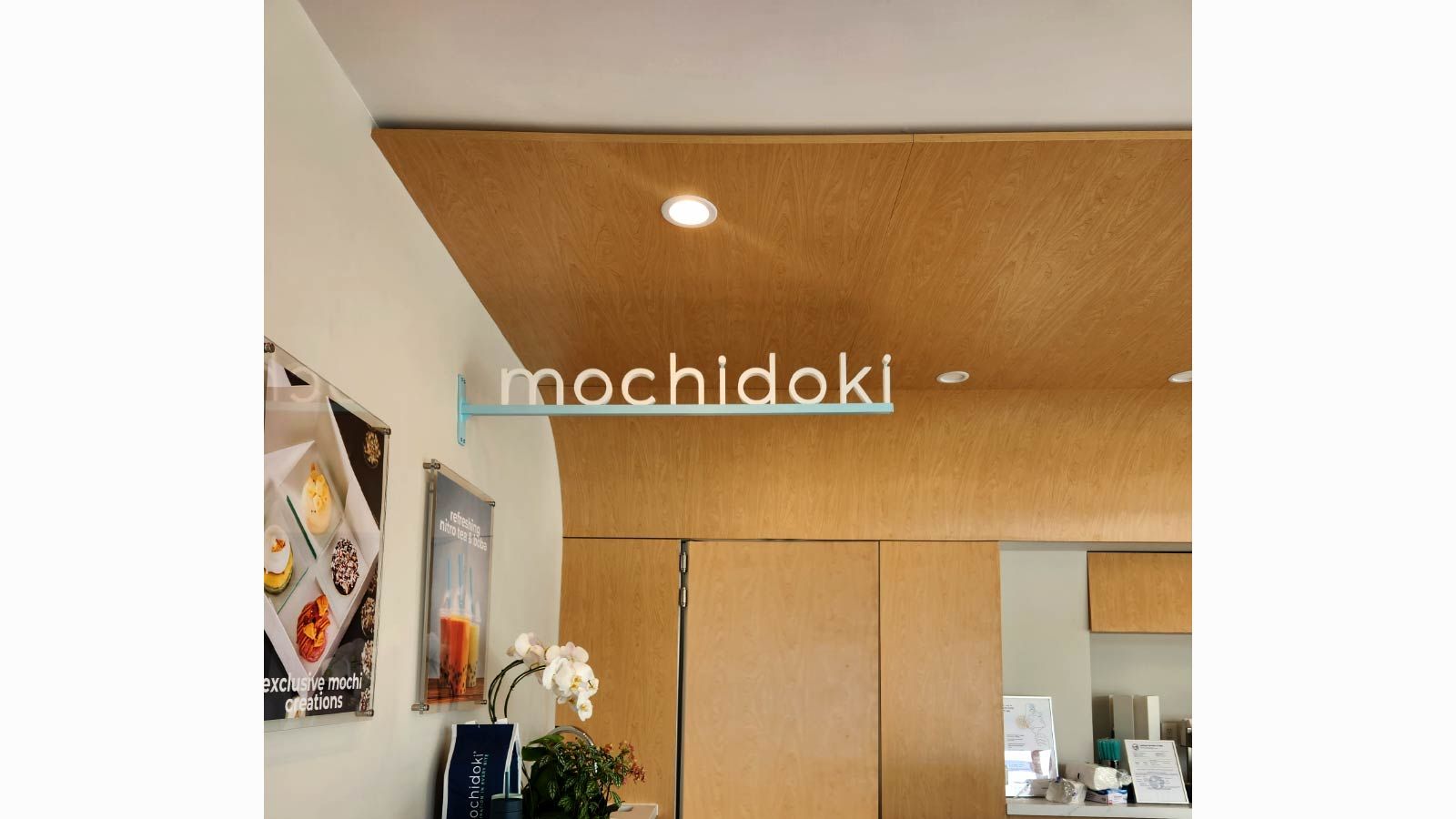 Mochidoki logo sign attached to the wall