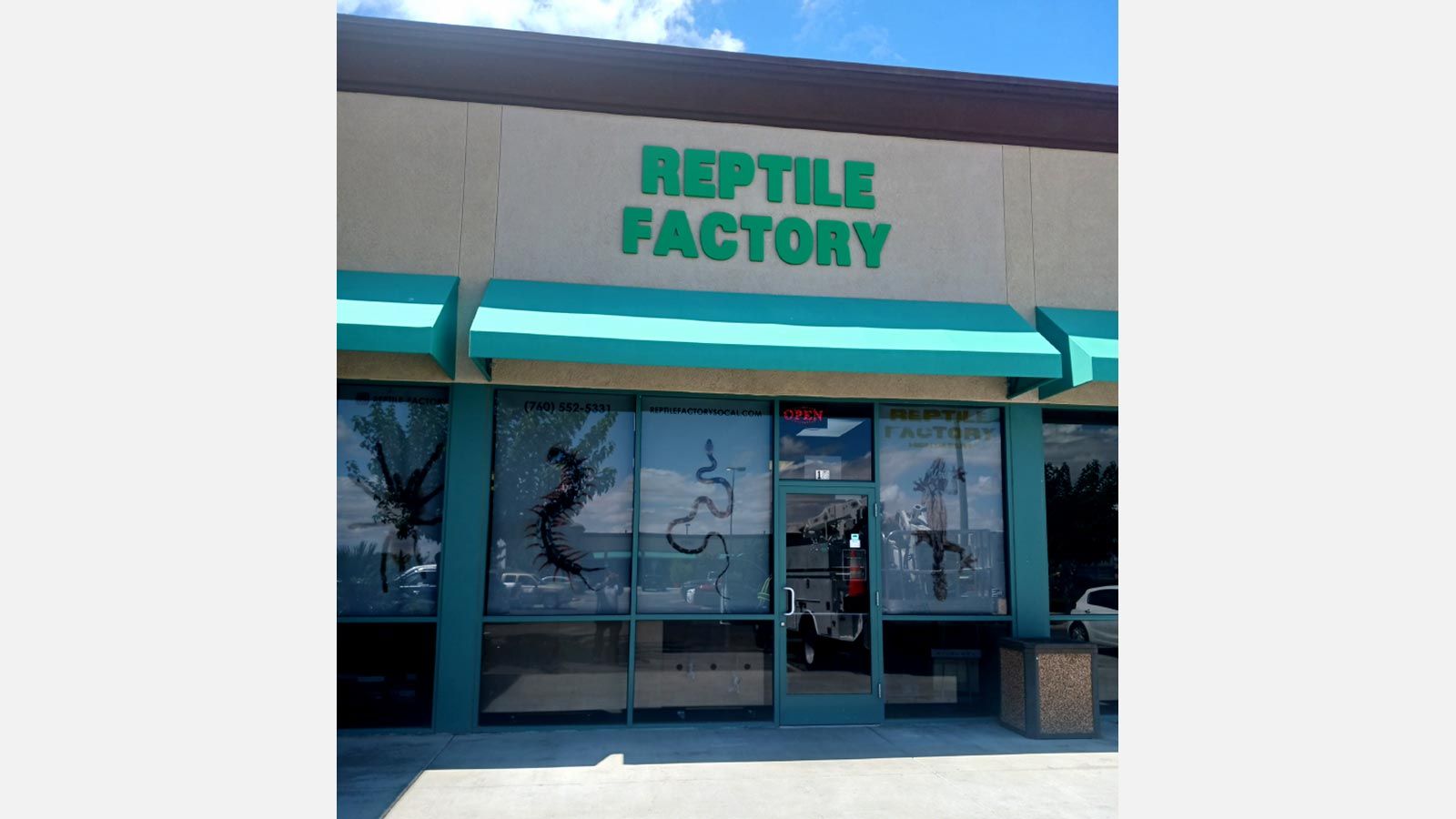 Reptile Factory outdoor sign installed on the building