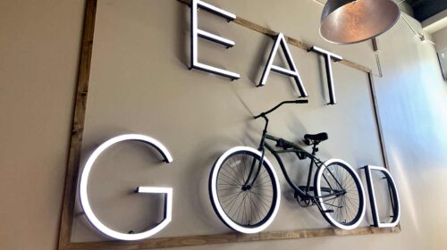 Eat Good channel letters mounted on a restaurant wall