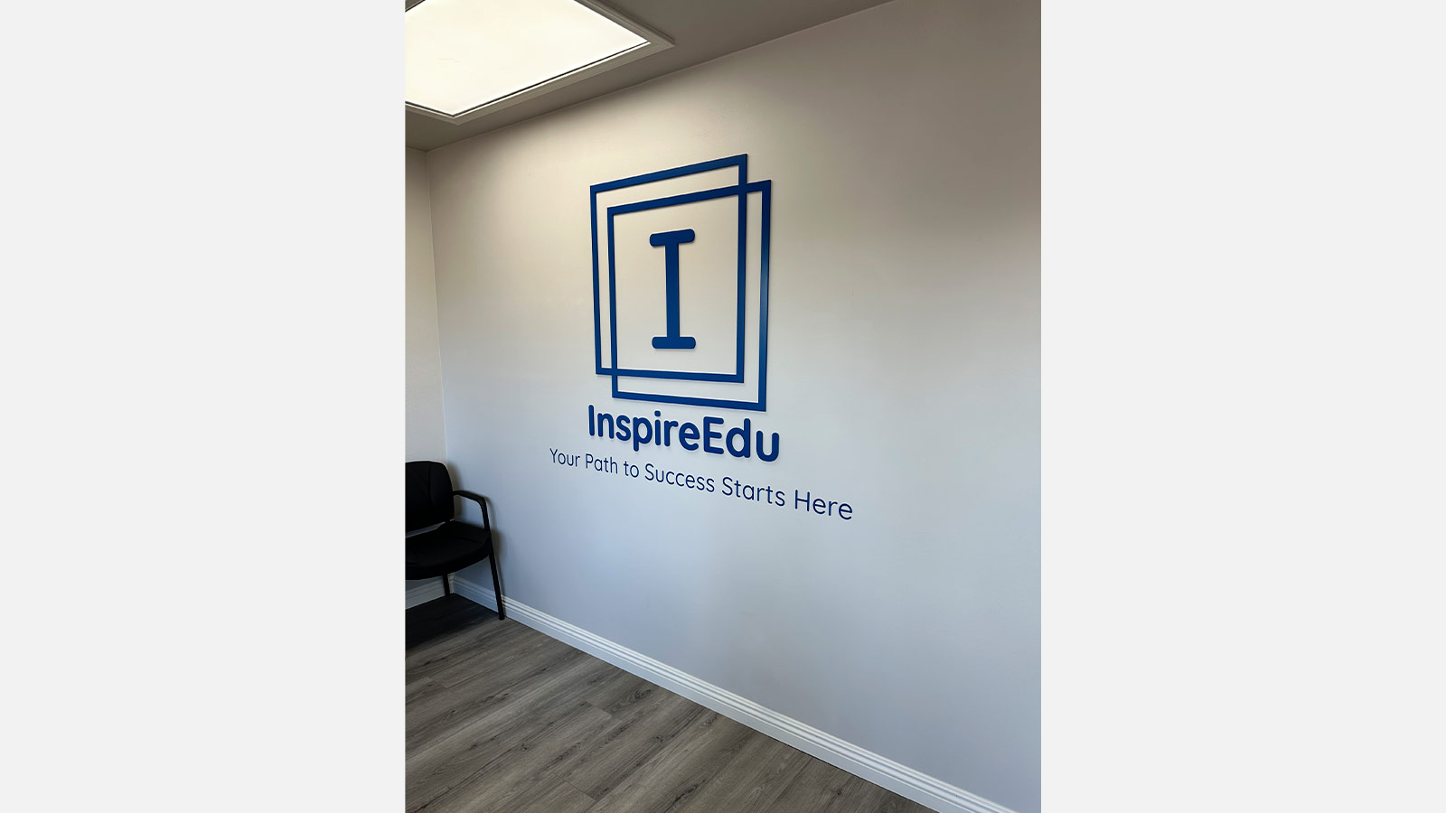 InspireEdu Consulting interior signs applied to office wall