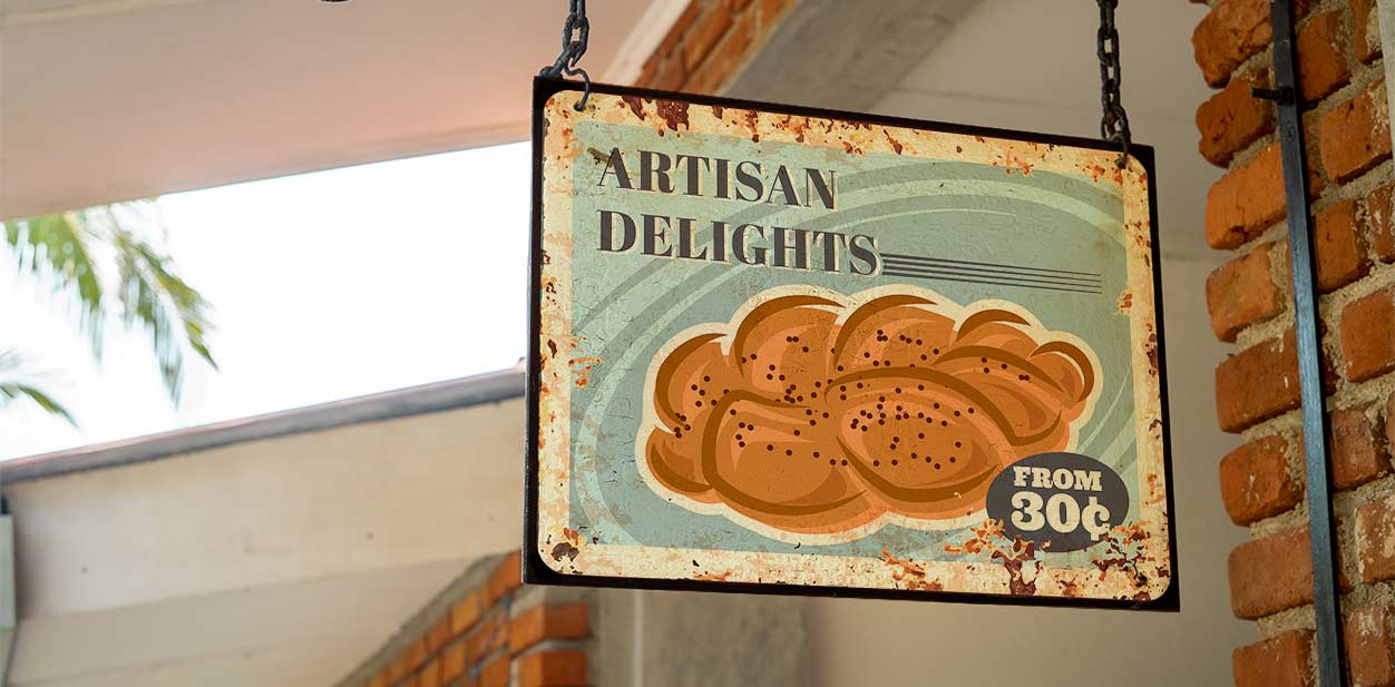 Vintage square bakery signage design depicting the company name and bread image