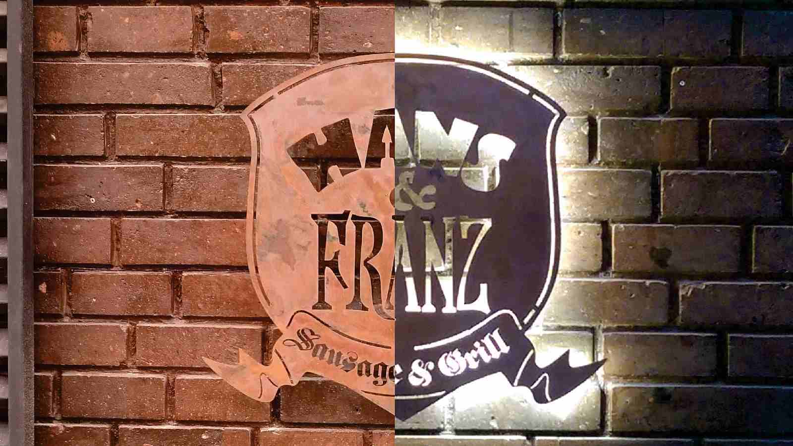 hans and franz backlit restaurant sign