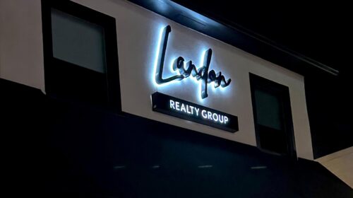 landon realty group light up signs and letters on the facade