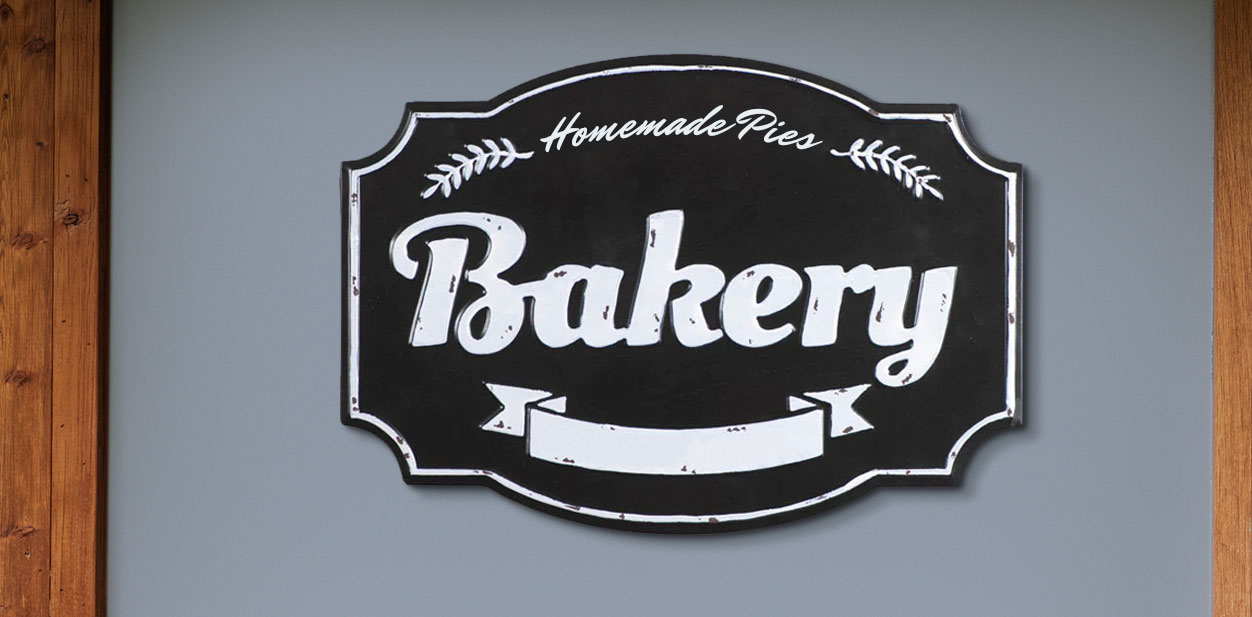 Black and white metallic bakery wall design featuring the text homemade pies bakery.