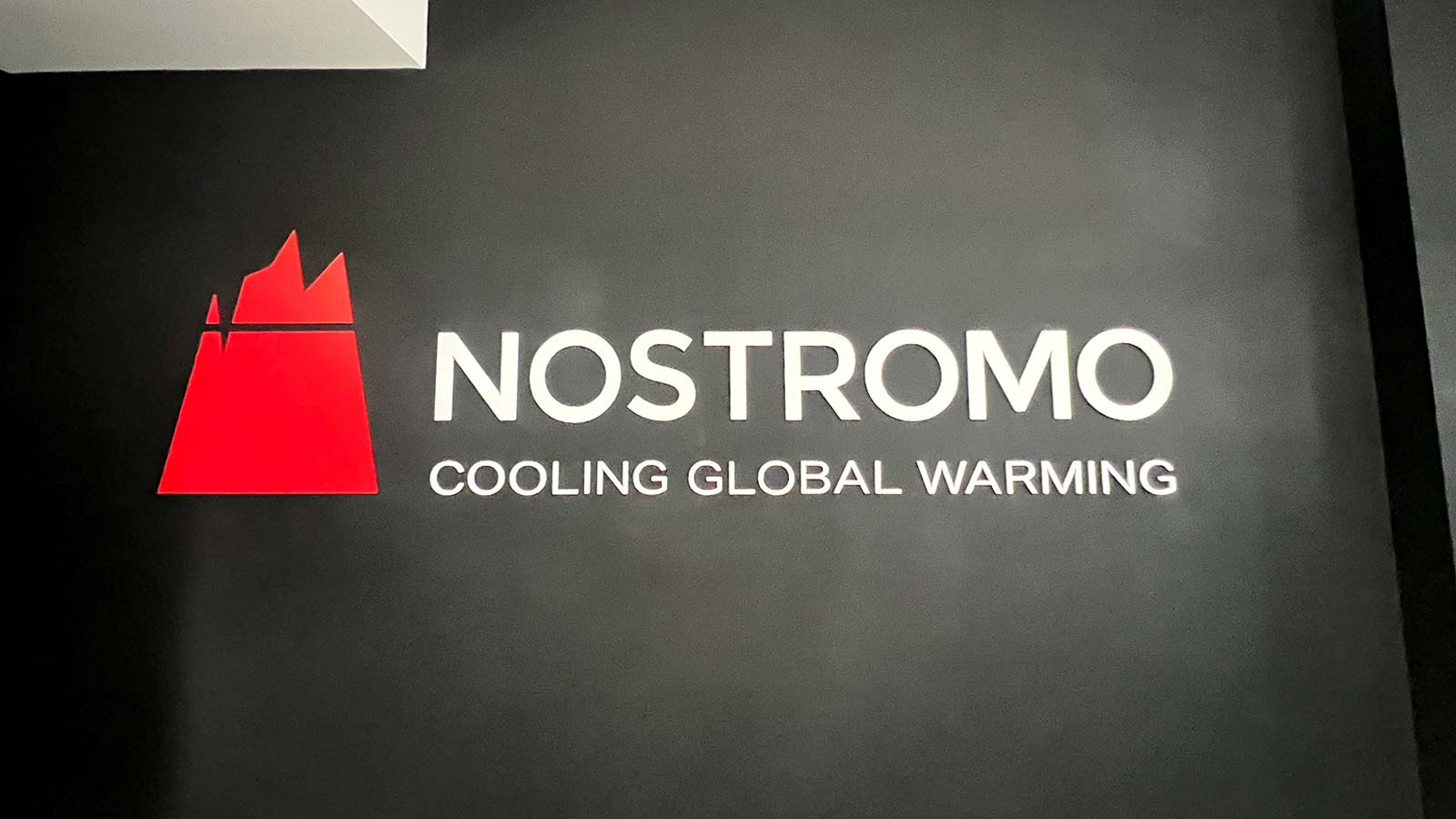 nostromo energy acrylic signs attached to the wall