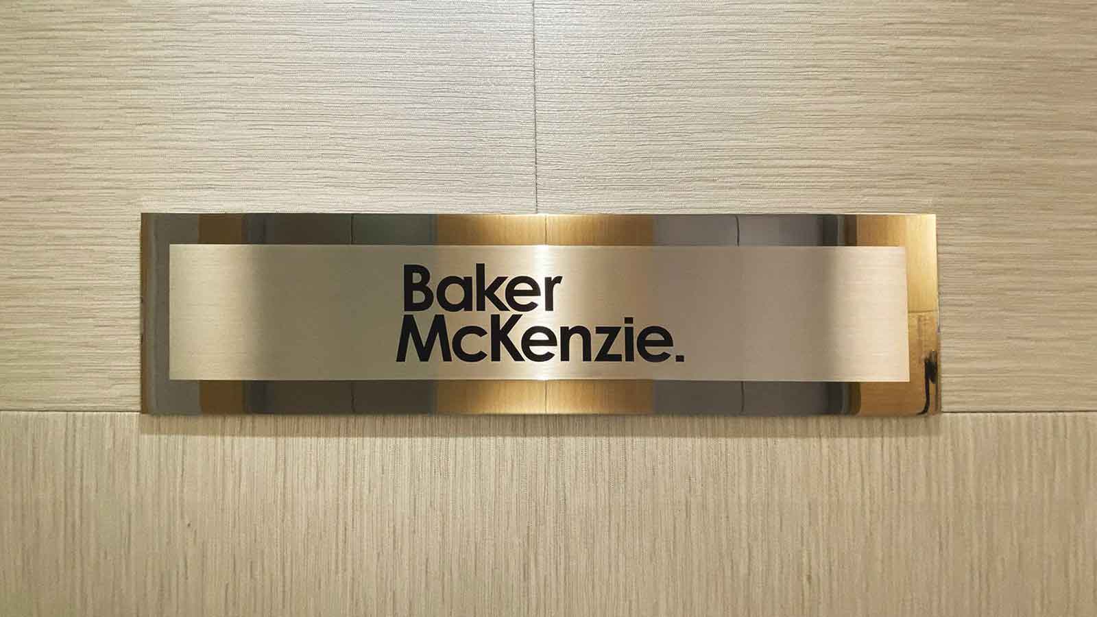 baker mckenzie brushed aluminum nameplate sign