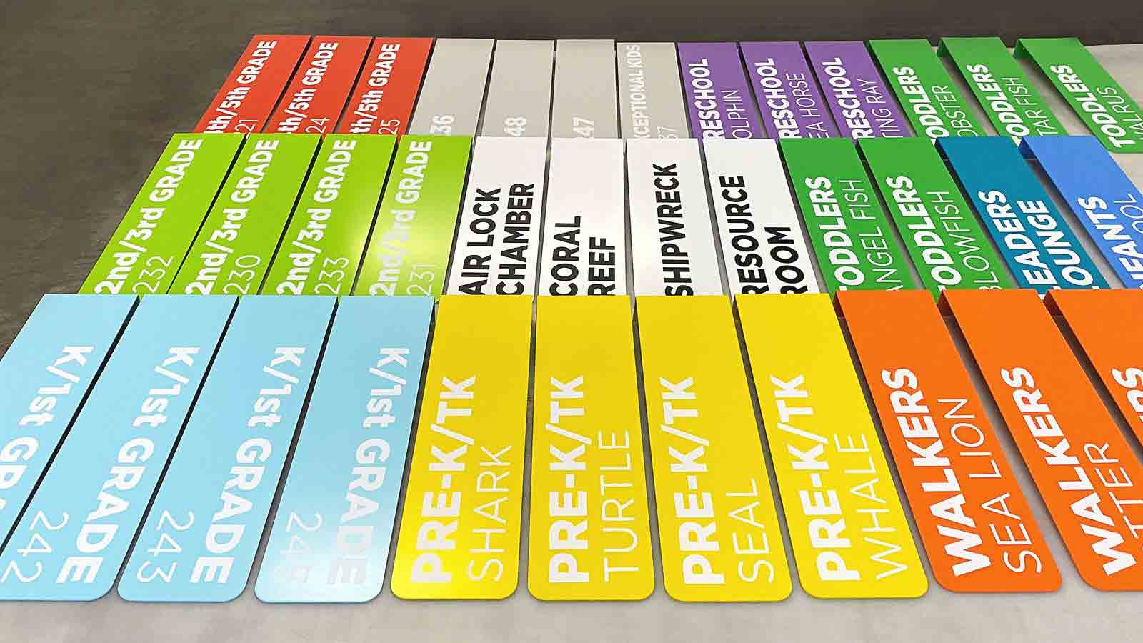 colorful directional aluminum school signs