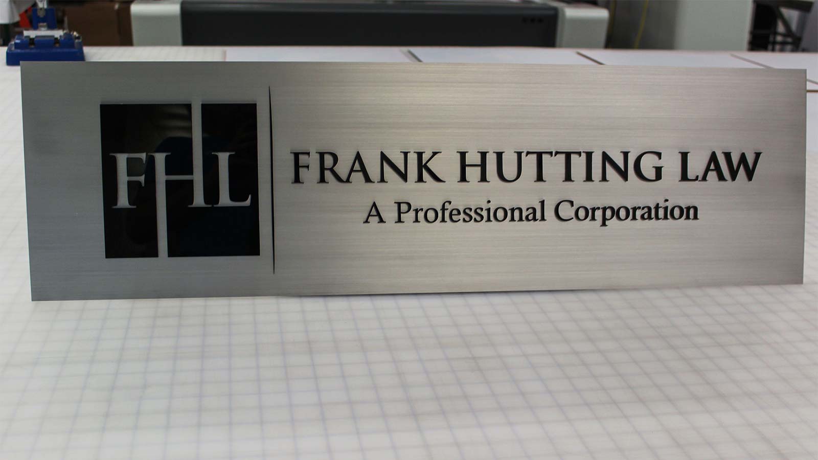 frank hutting law aluminum nameplate sign